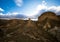 Arid barren badland, wild west desert landscape of Bannockburn Sluicings in former goldmine in Central Otago New Zealand