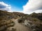 Arid barren badland, wild west desert landscape of Bannockburn Sluicings in former goldmine in Central Otago New Zealand