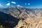 Arid colorful mountains under the blue sky