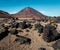 Arid mountain with rocks in the foreground