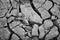 Arid nature. Closeup Crack soil black and white texture