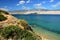 Arid shoreline with some durable shrubs and grass near Sveta Maria beach on Pag island, northern Dalmatia, Croatia, Adriatic.