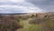 Ariel 4K drone footage of UK parkland landscape during springtime