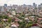 ariel panoramic view of old city and skyscrapers with the sea from the mountains