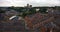 Ariel view of the city of durham showing streets of old brick houses the cathedral and castle with trees on the skyline