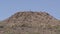 Arizona, desert, a zoom in on one lonely saguaro on top of a hill