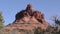 Arizona, Sedona, A view of Bell Rock framed by trees
