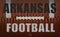 Arkansas Football Text on a Flattened Football