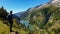 Arlhoehe - A man standing at the side of a mountain and enjoying the view on a lake below