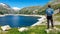 Arlhoehe - A man standing at the side of a mountain and enjoying the view on a lake below