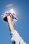 Arm of a cheerleader holding pom-pom