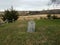 Arm of Stonewall Jackson grave and stone in grass