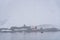 Armada De Chile Base, Gonzales Videla research station, view from the water on a snowy and foggy day, Paradise Bay, Antarctica