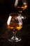 Armagnac, French grape brandy, strong alcoholic drink. Still life in vintage style, selective focus