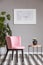 armchair in modern living room interior with grey wall and black and white floor