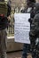 Armed Demonstrator Holds a Sign at the Ohio Statehouse Ahead of Biden`s Inauguration