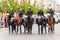 Armed mounted police forces standing at the beginning of Pride parade on Gedimino street. Event celebrating lesbian, gay, bisexual