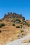 Armenia, Amberd, September 2022. The road leading to the old fortress and tourists on it.