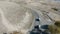 Armenia, Kotayk Province - Aerial view of two white minibuses driving to the temple of Garni