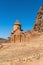 Armenia, Noravank, September 2022. Armenian temple on the platform under the red rock.