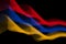 Armenia`s national flag of neon glowing intersecting lines