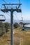 Armenia, Tsaghkadzor, September 2021. Cable car with tourists and mountain views.