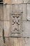 Armenian traditional crosses on the walls of the temple of Geghard monastery, Armenia.