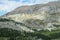 Armentarola - A distant view on a high mountain in Italian Dolomites. The mountain has characteristic geological lines