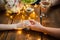 Arms. loving couple sitting at table and holding hands