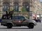 Army pickup UAZ-23632-148-64 with a five-seat cabin and two machine guns at the parade in honor of Victory day on red square.