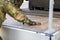 Army soldier lashed cargo with lashing material