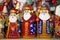 Army of wooden santa claus puppets at christmas market