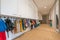 ARNHEM / NETHERLANDS - AUGUST 28 2020:  Cloakroom with coats and backpacks in a school building for toddlers and young children