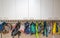 ARNHEM / NETHERLANDS - AUGUST 28 2020: Cloakroom with coats and backpacks in a school building for toddlers and young children