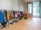 ARNHEM / NETHERLANDS - AUGUST 28 2020: Cloakroom with coats and backpacks in a school building for toddlers and young children