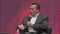 Arnold Schwarzenegger, famous actor, politician and businessman, speaks at a business forum