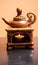 Aroma teapot ceramic with burning candles