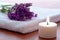 Aromatherapy Candle and Lavender Flowers in a spa