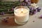 aromatherapy candle with a soothing blend of essential oils and scents