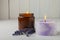 Aromatherapy concept, candle with lavender flowers.Soy candles with lavender scent.