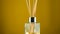 Aromatherapy diffuser, home perfume concept, reed diffuser rotate on background