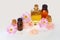Aromatherapy essential oil in medical glass bottles with chrysanthemum flowers and bath salt for SPA and Wellness on white