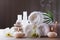 Aromatherapy, spa, beauty treatment and wellness background with massage pebbles, orchid flowers, towels, cosmetic products