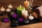 Aromatherapy, spa, beauty treatment and wellness background with massage stone, orchid flowers, towels and burning candles