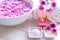 Aromatherapy Spa with candle and pink flower spa and rolled towel. Thai Spa relax Treatments and massage white background,