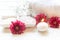 Aromatherapy Spa with candle and red flower spa and rolled towel. Thai Spa relax Treatments and massage white background,