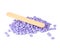 Aromatherapy violet lavender wax drops for depilation isolated on the white