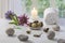 Aromatherapy votive candles burning with a soft glowing flame for wellness treatment in spa