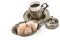 Aromatic black coffee in a stylish cup and Turkish delight isolated on a white