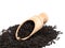 Aromatic black tea and wooden shovel